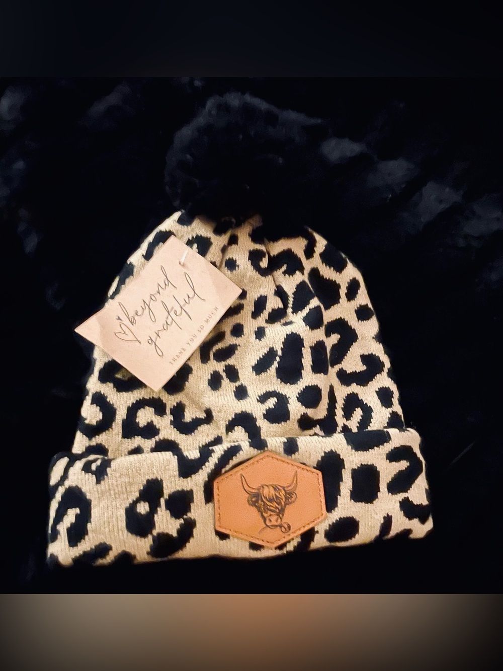 Leopard Print Pom Beanie - Black & Tan W/LEATHER COW STAMPED.